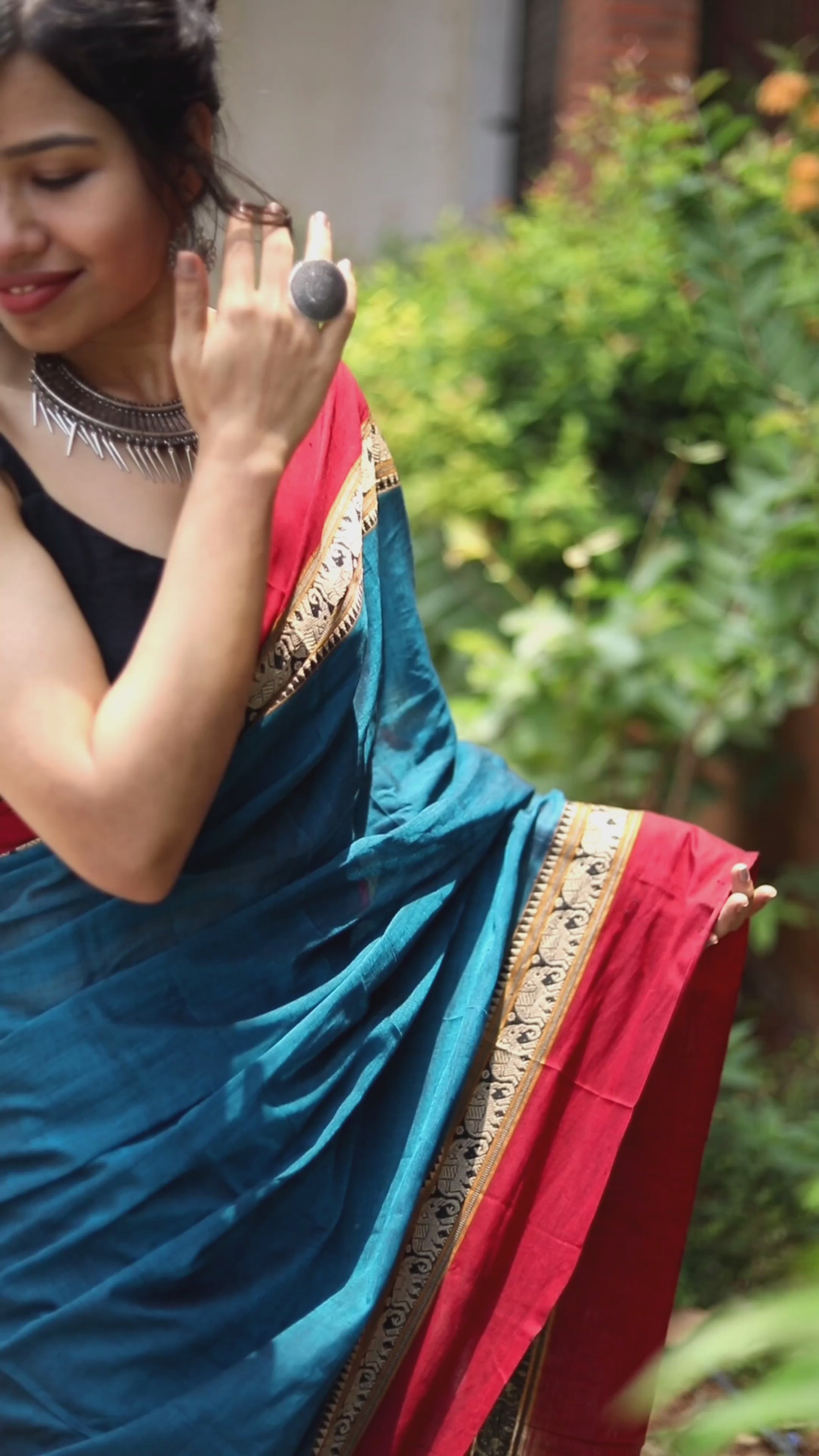 woman in blue saree